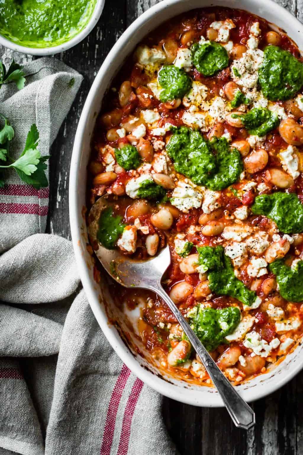 Tomato Baked White Beans with Lemon Parsley Oil